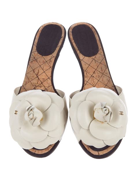 chanel camellia sneakers price|Chanel camellia slide sandals.